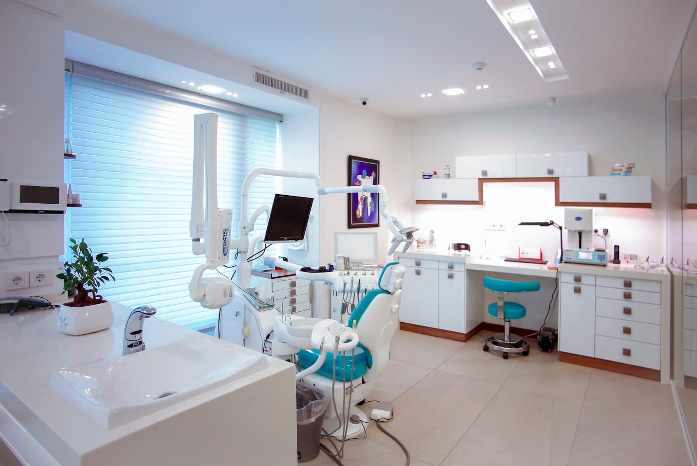 Modern Australian dental clinic interior with teal accent chair